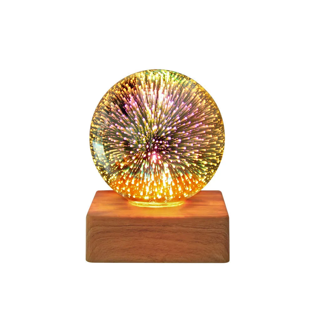 Spherical crystal ball night light with USB plug showing starry sky pattern illumination