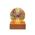 Spherical crystal ball night light with USB plug showing starry sky pattern illumination
