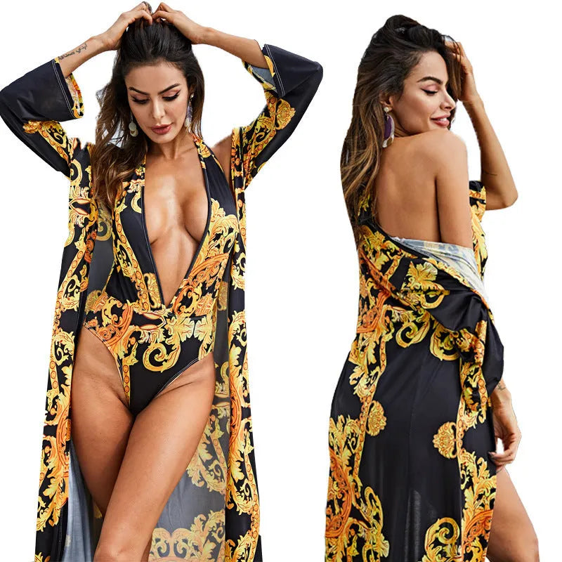 Printed cloak bikini in polyester, available in black or white, sizes M to 2XL