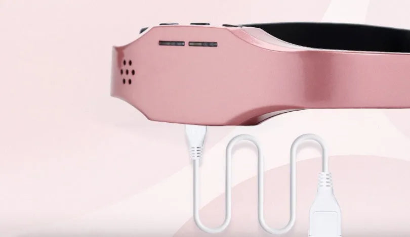 Wireless head massager in black or pink with adjustable fasteners, 110g, USB rechargeable, 3 modes and 9 intensities.