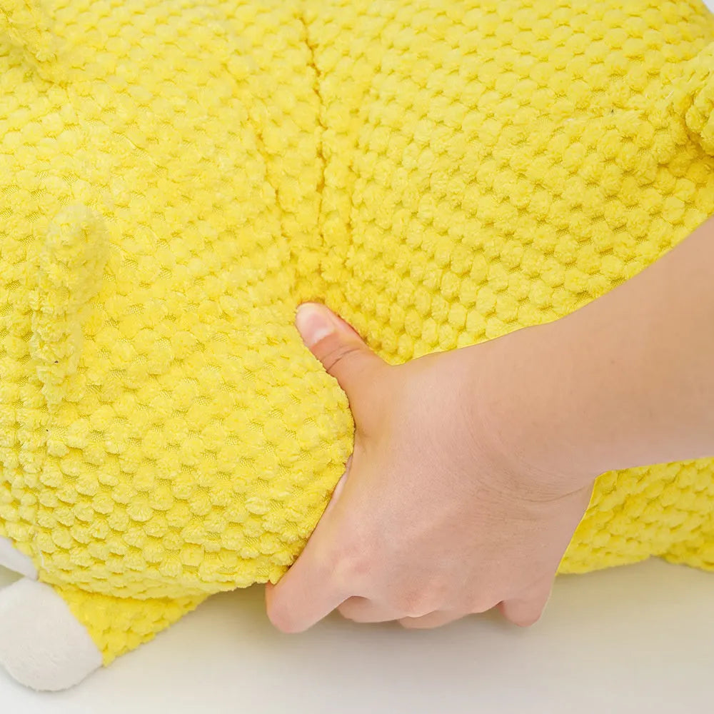 Calming plush dog toy with squeaker vocalisation feature in bite-resistant material