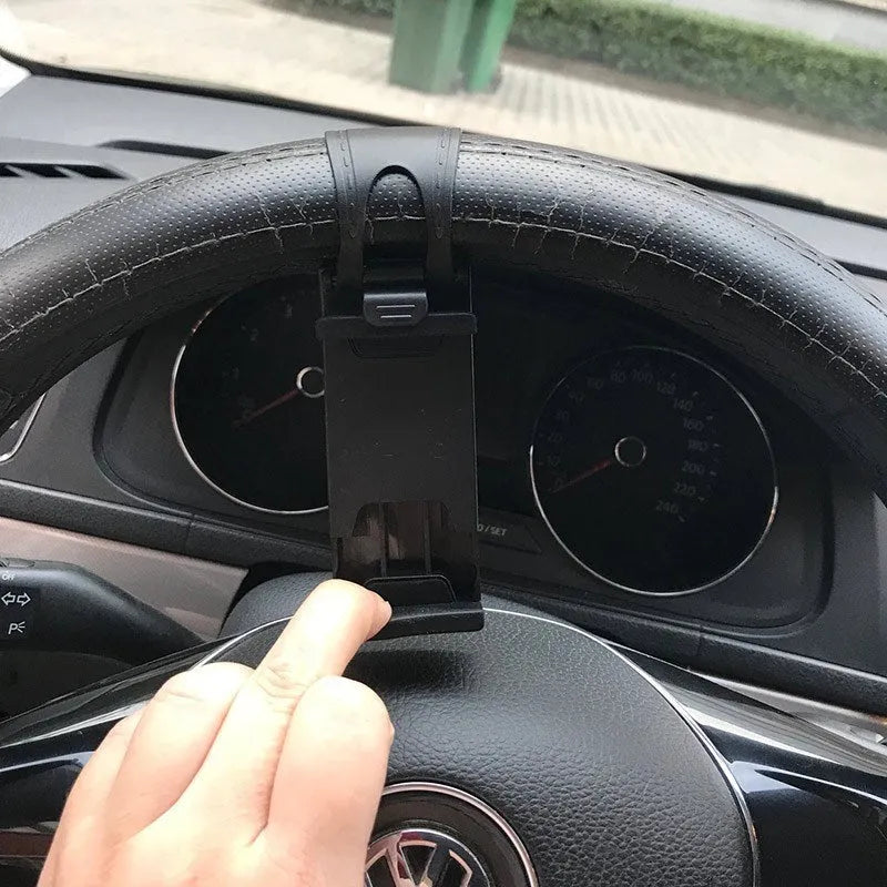 Black steering wheel phone holder mounted showing phone compatibility with dimensions 75x40x25mm