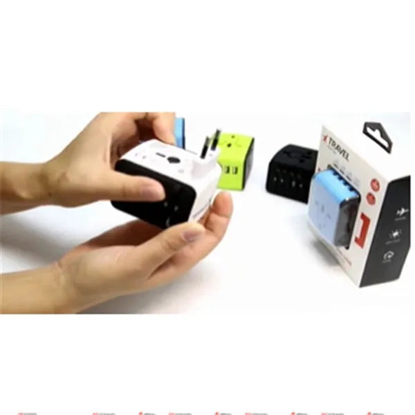 Universal travel adapter with 4 socket holes, 66 x 53 x 52mm, 1500W, PC shell, black blue or green