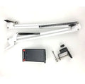 Black adjustable phone and tablet stand on a desk, measuring 10cm in height.