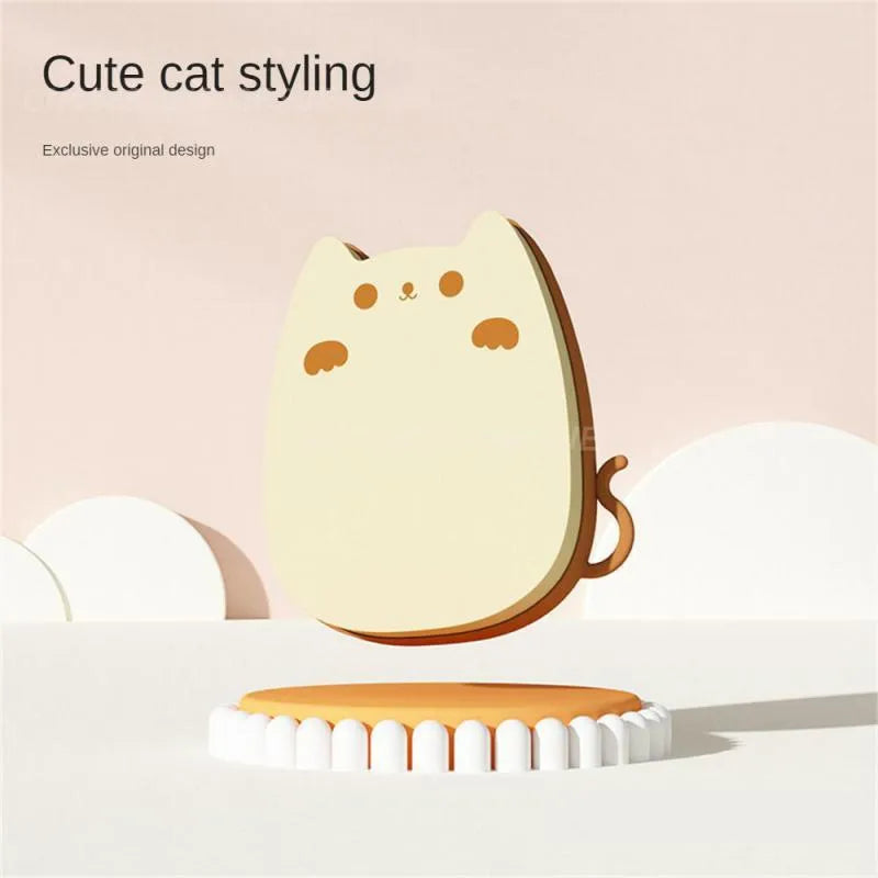 Brown silicone pet comb with dual-texture teeth for grooming cats and dogs.
