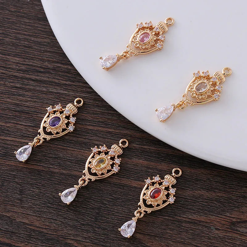 12x23mm water drop-shaped copper pendant with hollow crown design and zircon accents in five colour options