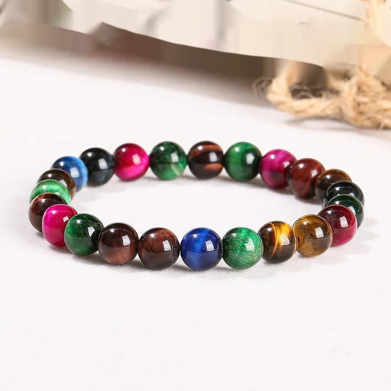Women's natural Tiger Eye beaded bracelet with colourful mixed stones in round shapes.
