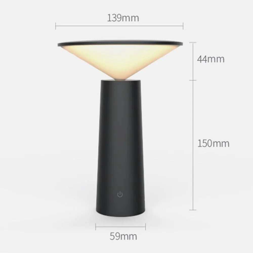 Black USB desk lamp with touch sensor and adjustable head on a wooden table