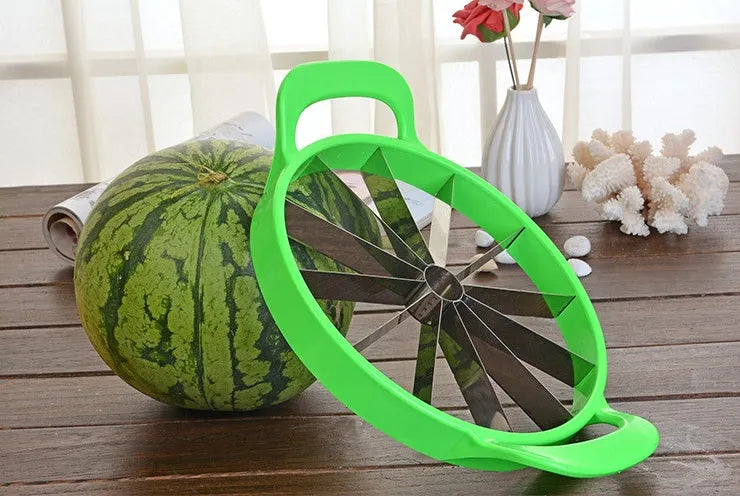 Green plastic and stainless steel melon slicer tool on a kitchen counter.
