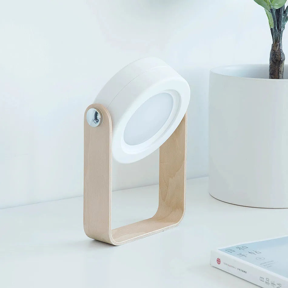 White foldable LED night light in table lamp mode with touch dimmer and USB port
