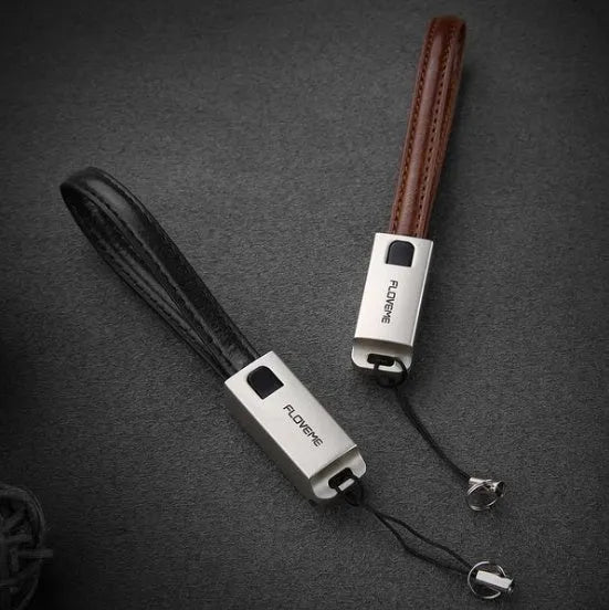 Short leather-wrapped USB-C to Lightning charging cable in black, brown, or red colour with zinc alloy connector