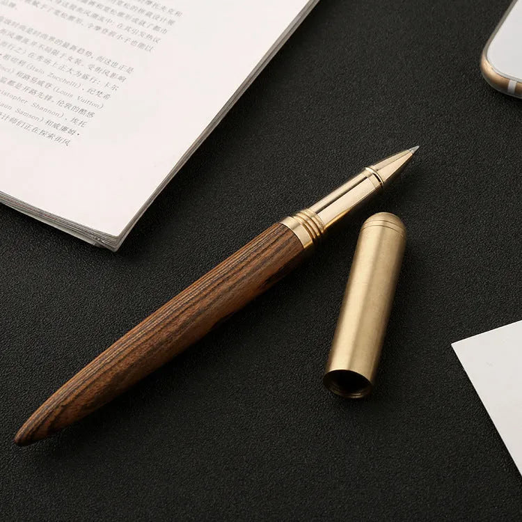 Brass and solid wood signature pen in choice of five wood finishes including ebony and rosewood.