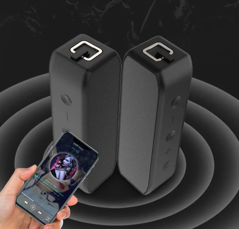 Black waterproof wireless bluetooth speaker with control buttons