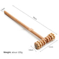 Assortment of natural beechwood massage rollers and Gua Sha tools including T-shaped and multi-wheel designs.