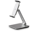 Silver foldable desktop holder supporting tablet with 360° rotation mechanism visible