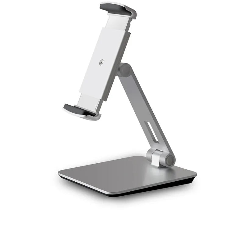 Silver foldable desktop holder supporting tablet with 360° rotation mechanism visible