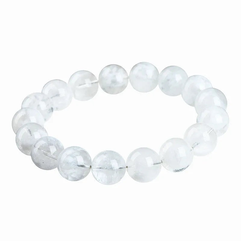 Women's crystal bracelet with round geometric beads in blizzard colour, showing Ruyi and Xiangyun design motifs.