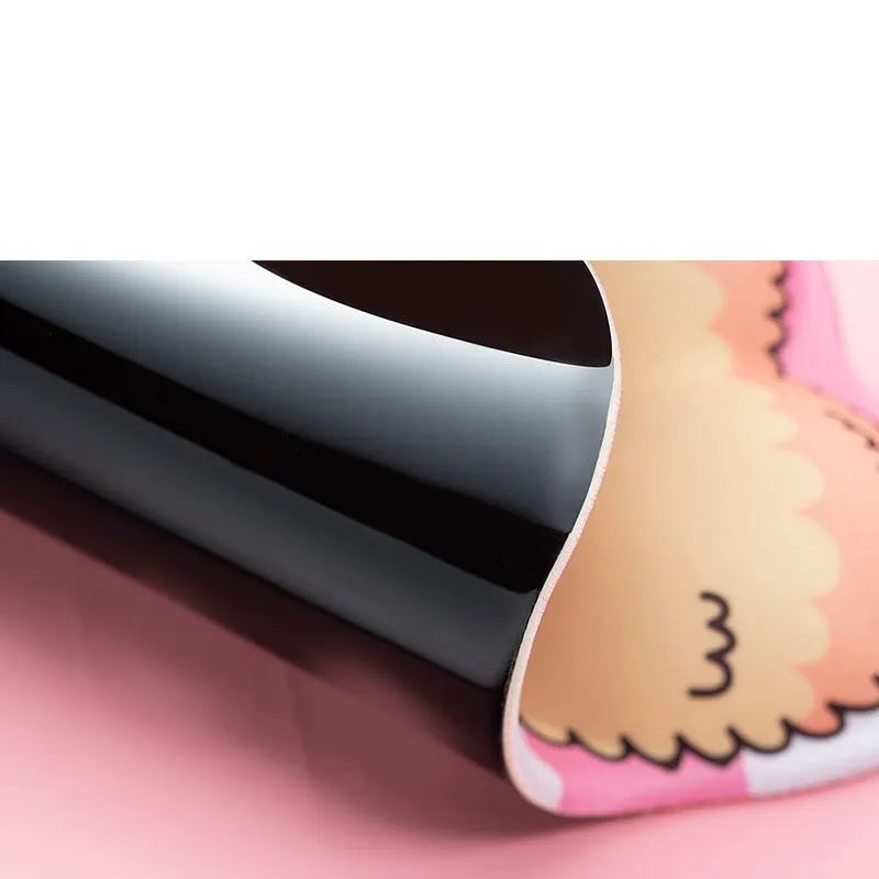 3D corgi design computer mouse pad with integrated soft wrist support cushion on desk.