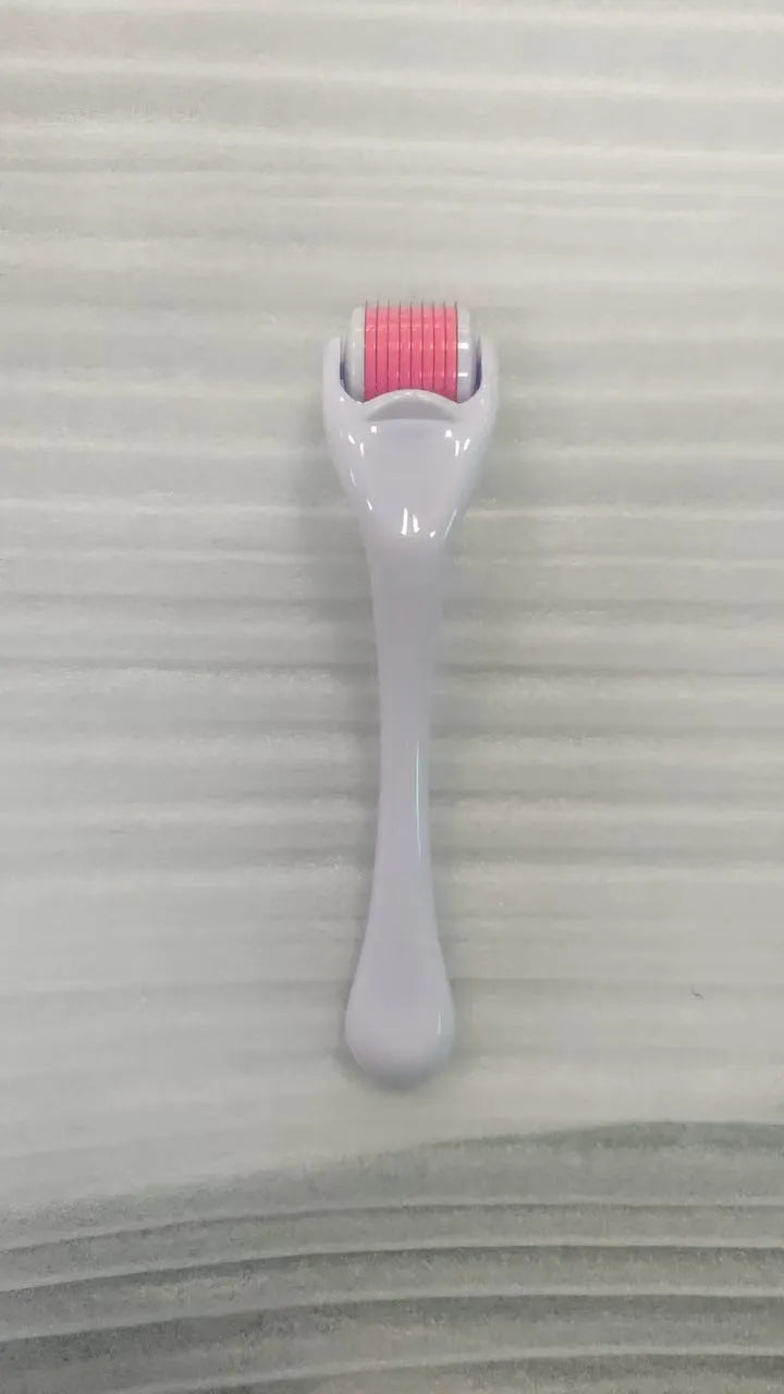 540 micro needle roller with PC handle and coloured wheel showing needle configuration for skin treatment