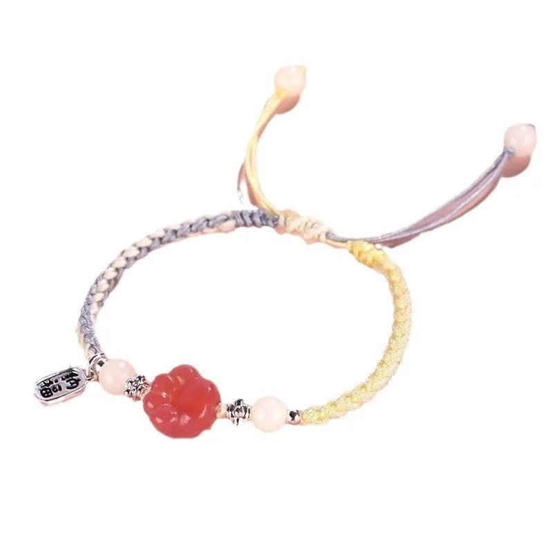 Red cat's paw couple bracelet with woven glass beads in handcrafted pastoral design