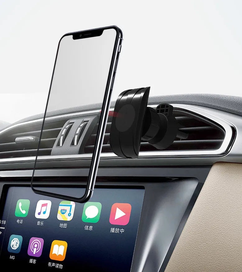 Black car phone holder attached to vehicle air vent with smartphone securely mounted