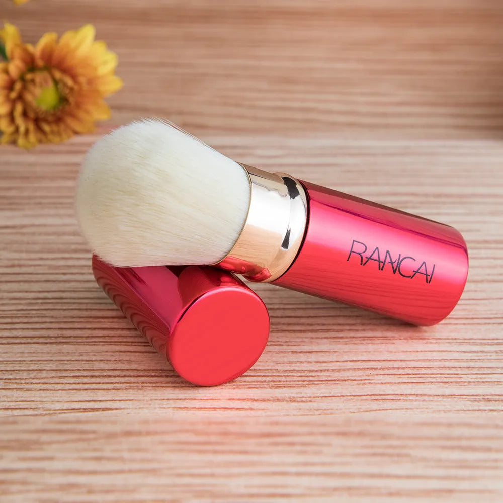 9cm retractable makeup brush with aluminium tube and fibre wool bristles, shown in black and red