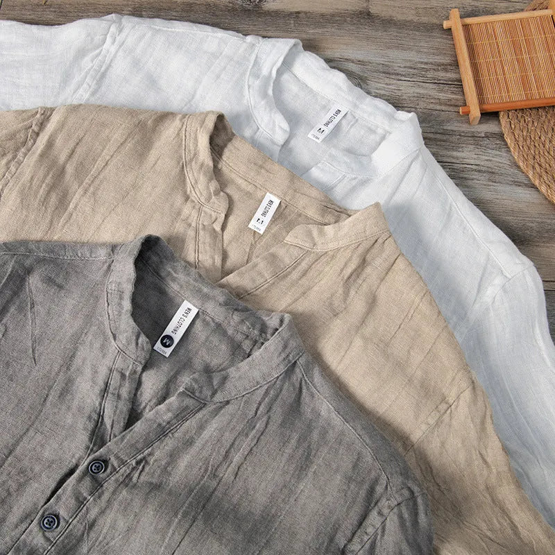 Retro-style short sleeve linen pullover top in a solid neutral colour on a hanger.