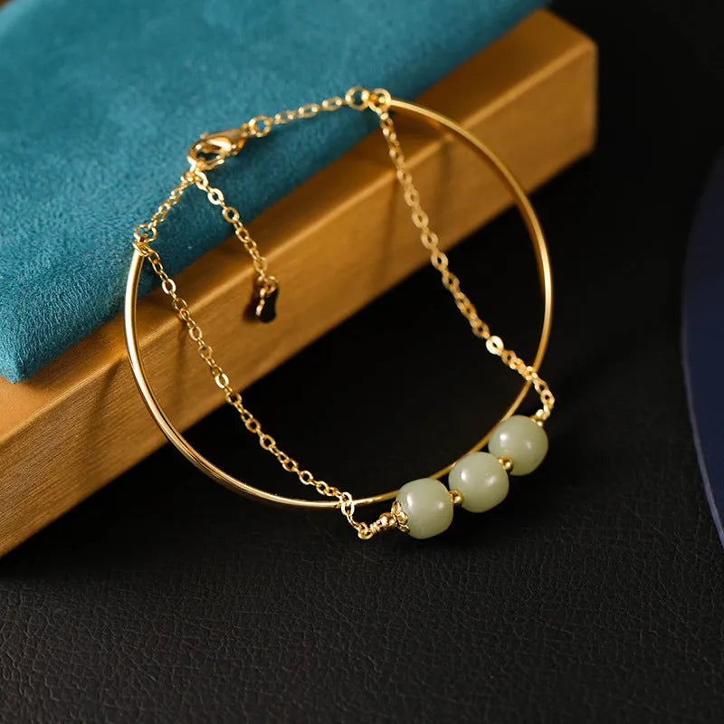 Hetian jade bracelet with gold-inlay treatment in single, double, or three-bead versions for women