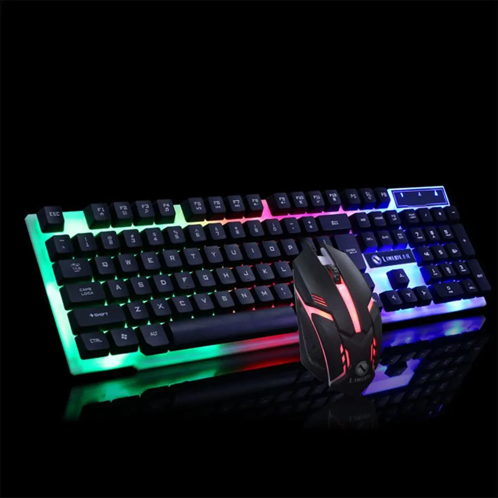GTX300 black and white wired gaming keyboard and mouse set with backlit keys on a desk.