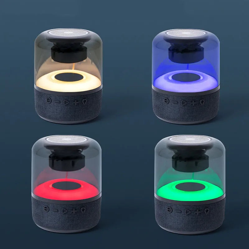 Black wireless Bluetooth speaker with 360-degree sound, compact design, and mechanical keys for control
