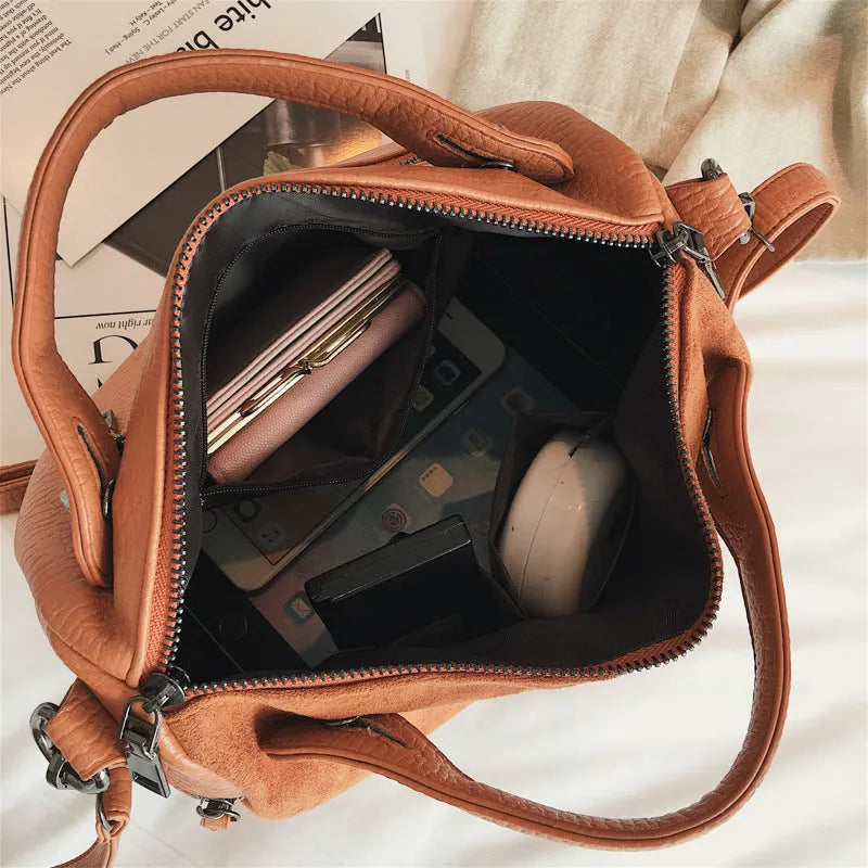 Soft PU women's tote shoulder bag showing smooth zipper and high-quality hardware in black colour option