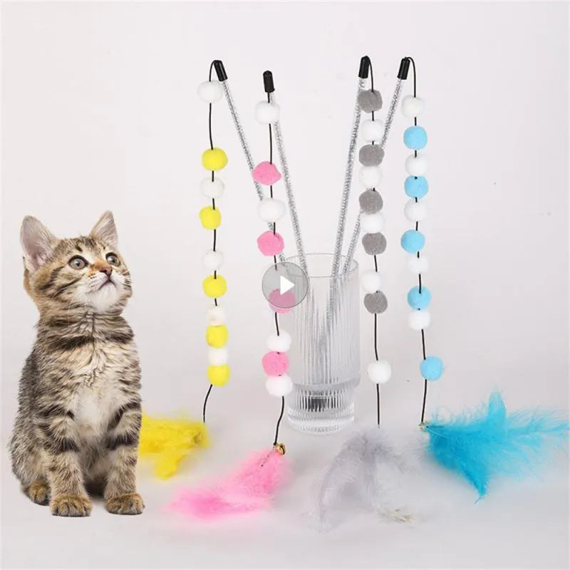 31cm long cat teaser rod with feather and bell attachments in multiple colour options