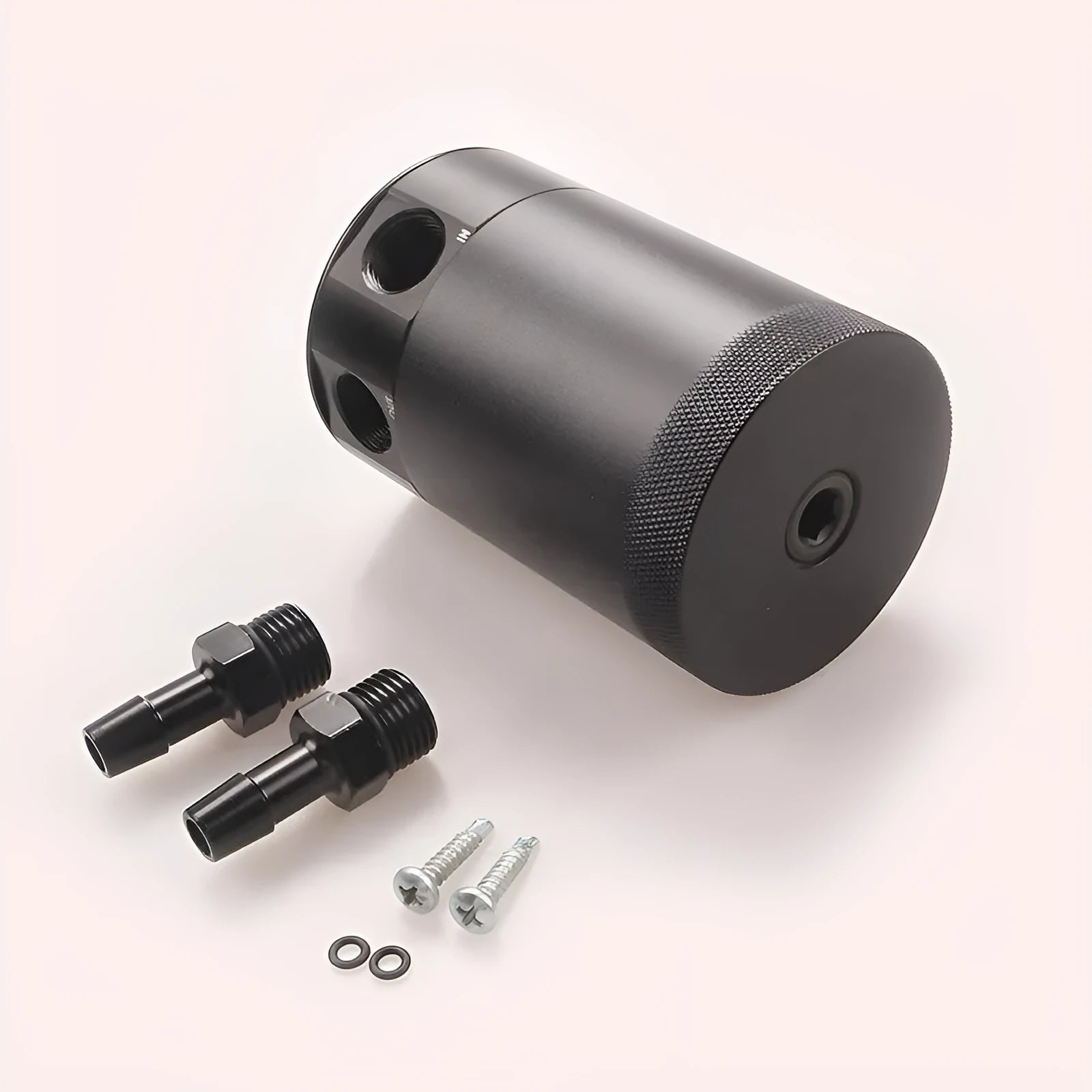 Black and silver aluminium automotive oil pot with two ports and connectors