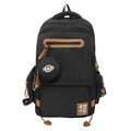 Large waterproof travel backpack in black with contrast colour stitching showing 20-35 litre capacity