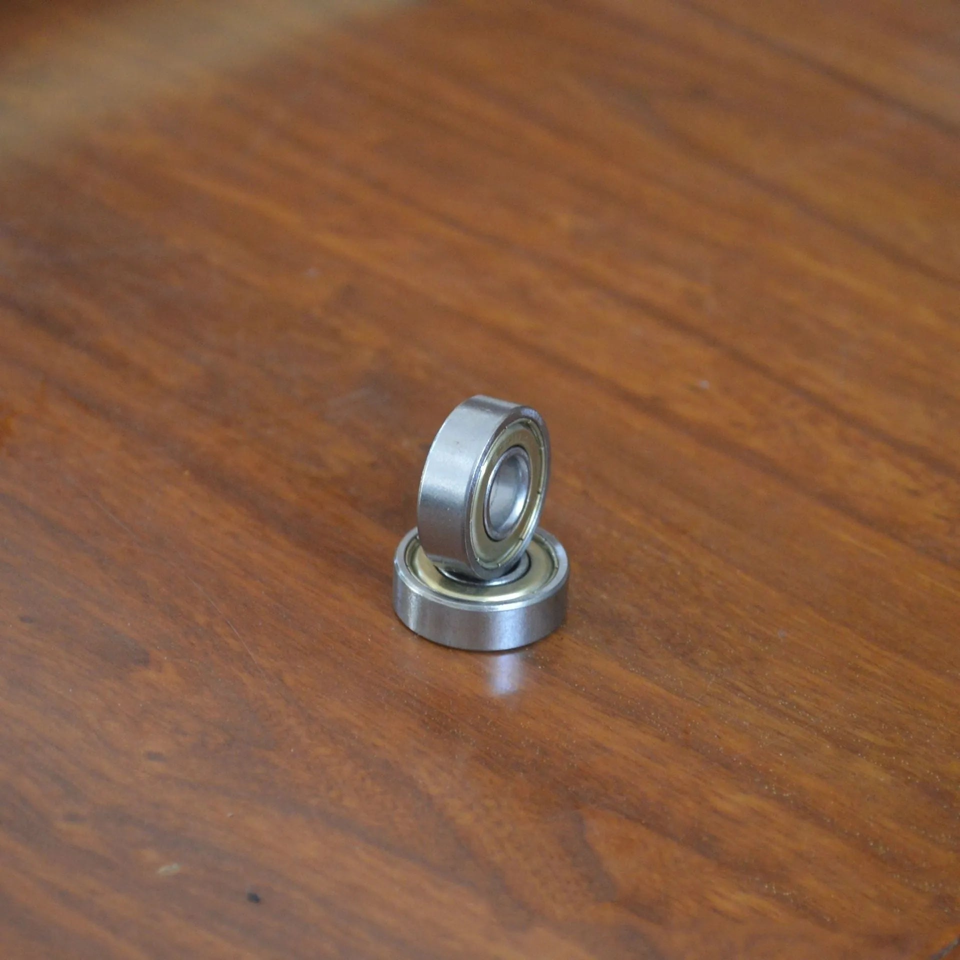 6000zz carbon steel radial ball bearing with 10mm bore, 26mm outer diameter, and steel retainer.