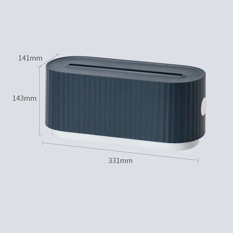 Blue and white power strip storage box with lid showing cable holes and internal phone slot