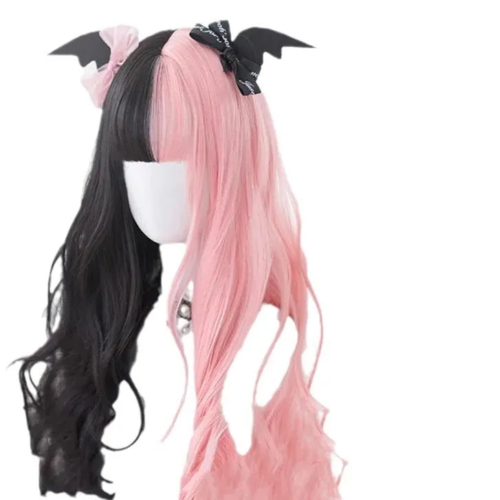 Harajuku Japanese Lolita long curly wig in black and pink colours with bangs on a wig stand.