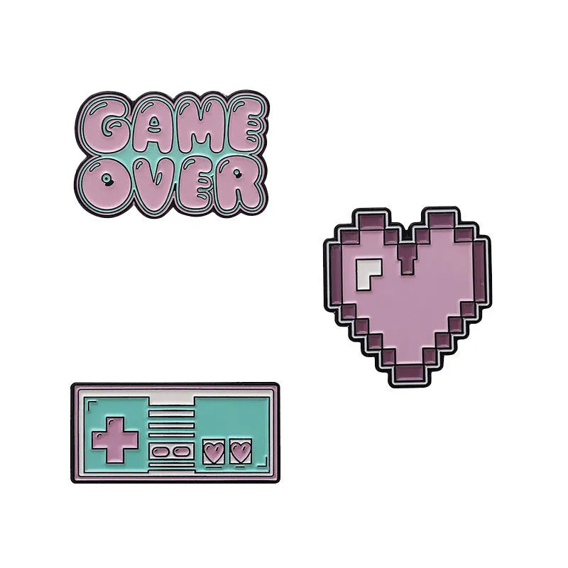 Three-dimensional alloy game console badge in metallic finish with mounting points