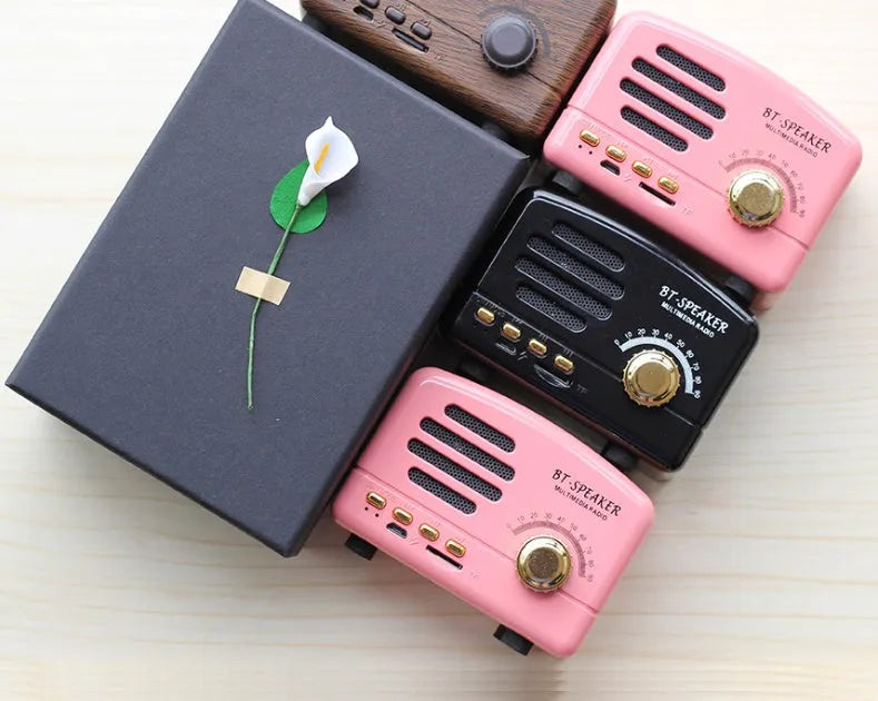 Vintage wood Bluetooth speaker in black finish showing compact 93mm height with control buttons