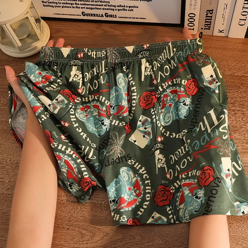 Cotton printed men's boxer shorts in grey blue green patterns with loose mid-waist fit