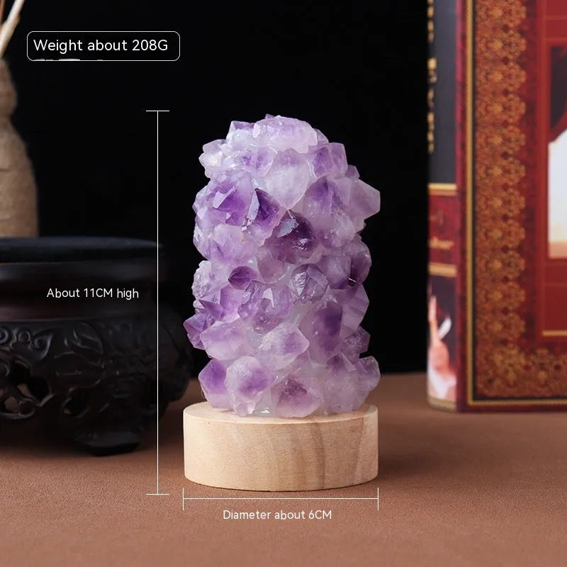 Mini amethyst crystal night light with USB cable, showing natural purple colour and crystalline tooth flower structure.