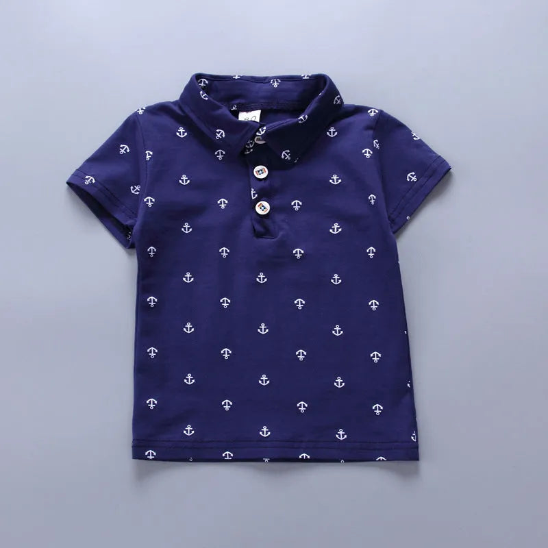 Anchor print children's cotton pullover pants suit in blue, shown flat.