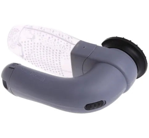 Grey portable pet hair vacuum cleaner and massage brush for dog and cat grooming on sofa