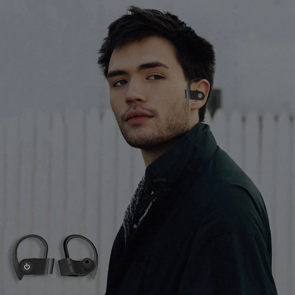 Black wireless Bluetooth earphones with silicone ear tips showing LED indicator and control buttons