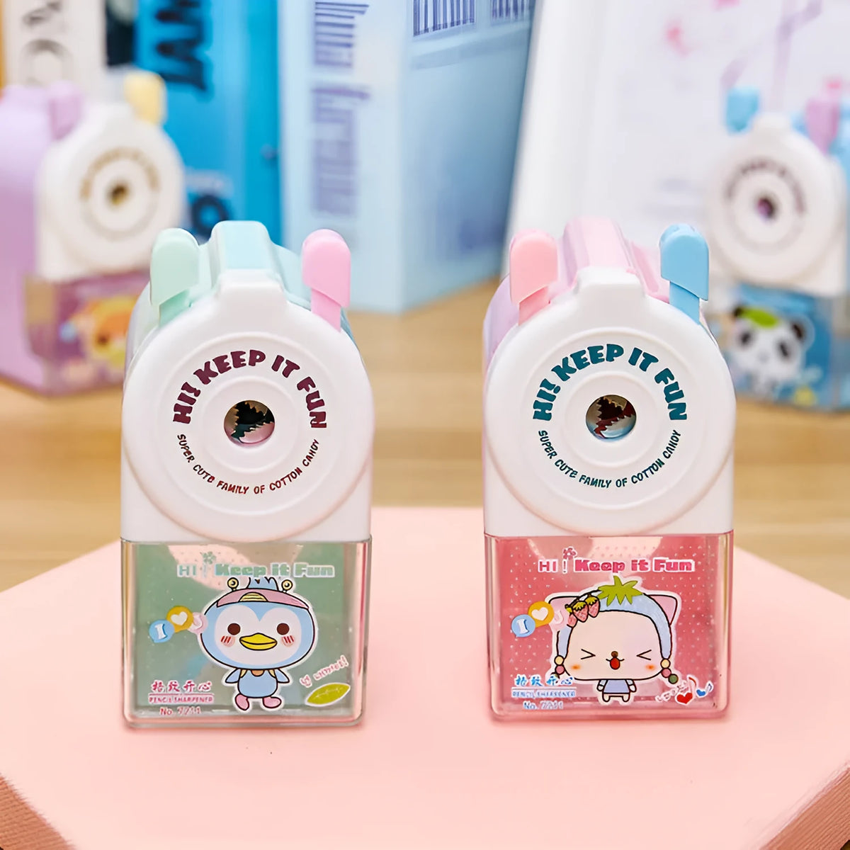 Cartoon geometric pet pencil sharpener in blue, green, pink, and purple colour options