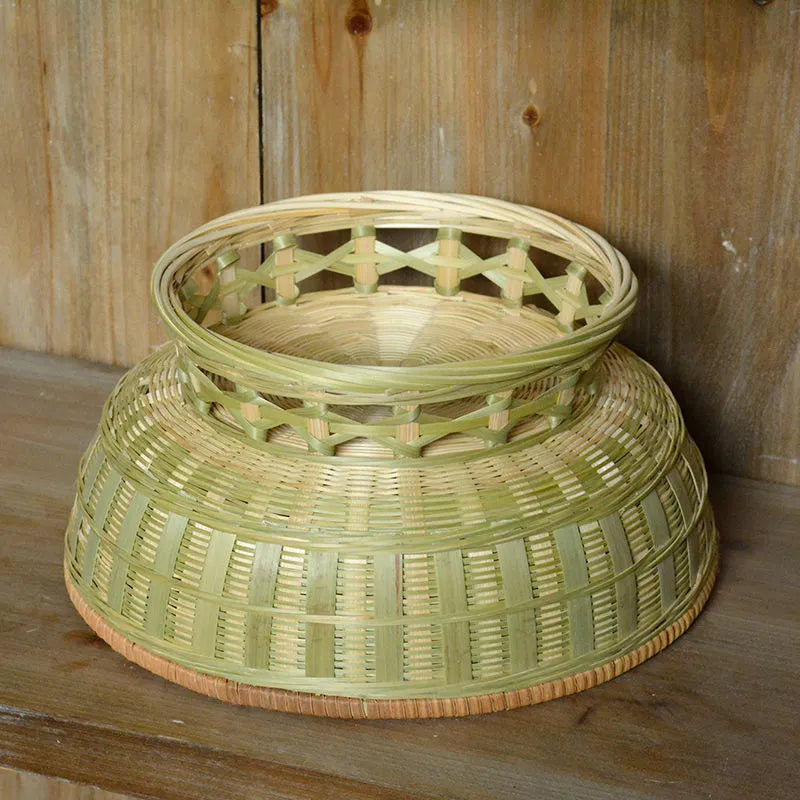Handmade bamboo storage basket showing woven construction with three size options for household organisation
