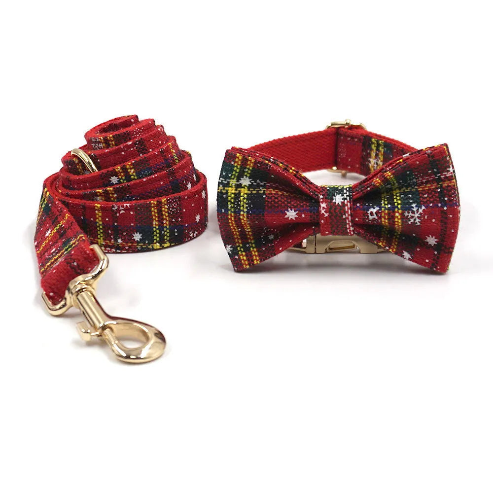 Red Christmas pet collar set with matching traction rope, bow, chest back, and stool bag accessories