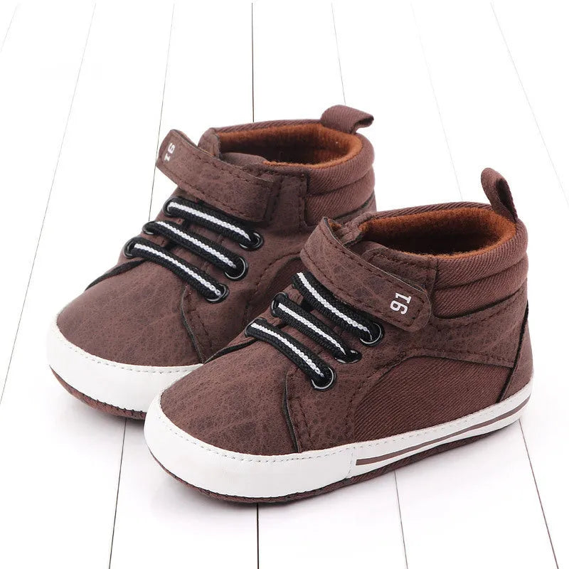 Blue cotton high-top toddler shoes with Velcro closure and non-slip sole