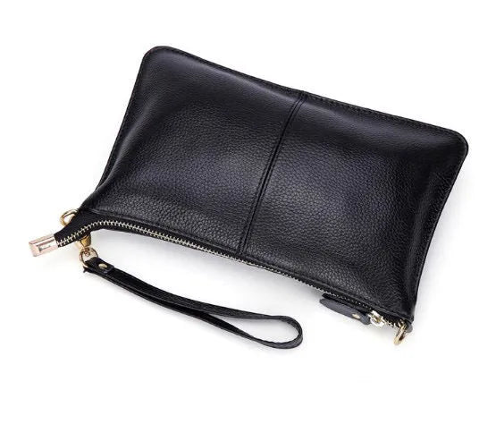 Lady cowhide slant bag showing compact dimensions and multiple compartments for organisation