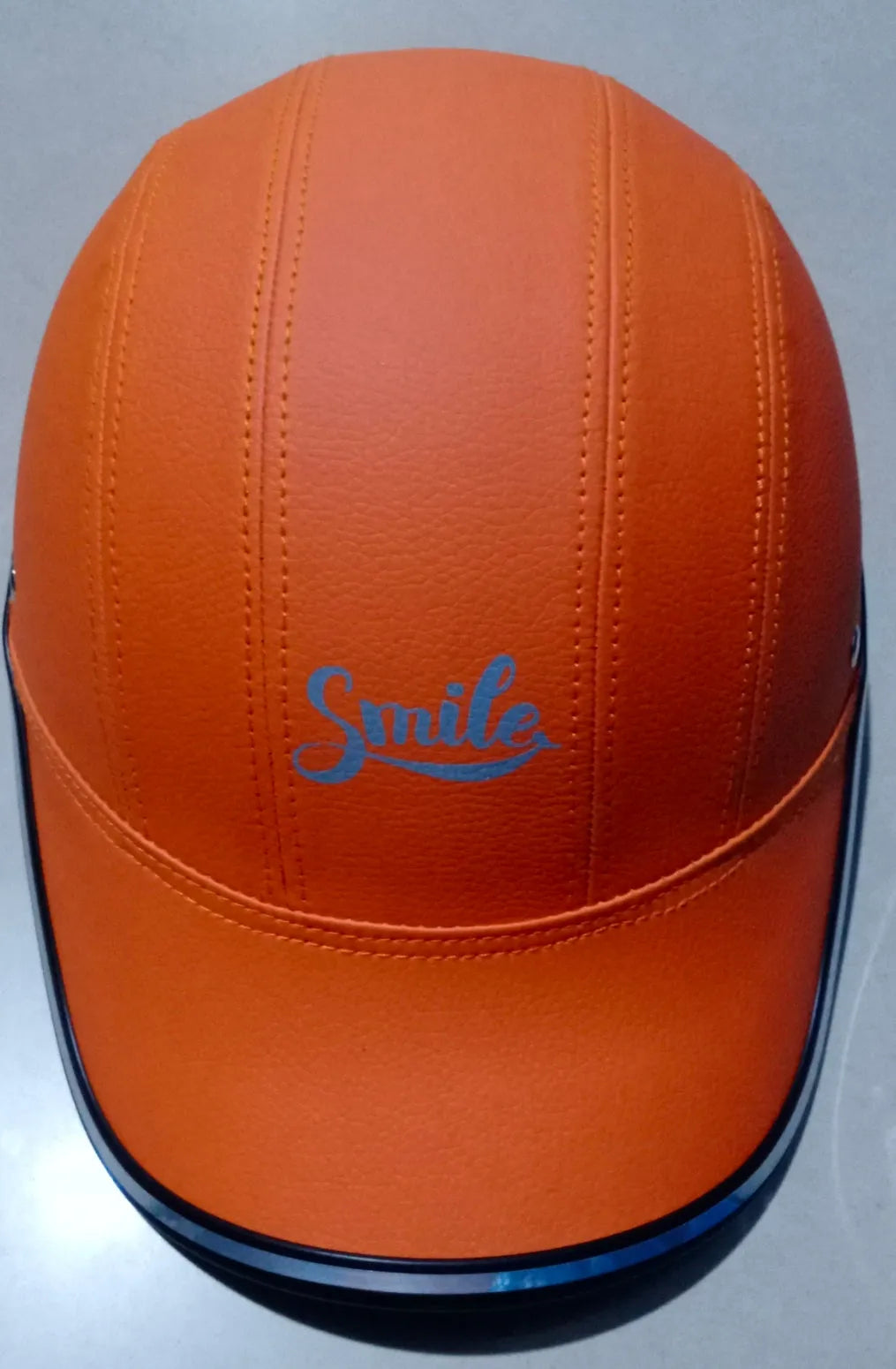 Adult motorcycle helmet with ABS plastic shell and PU leather lining, available in multiple colours with back or front logo.
